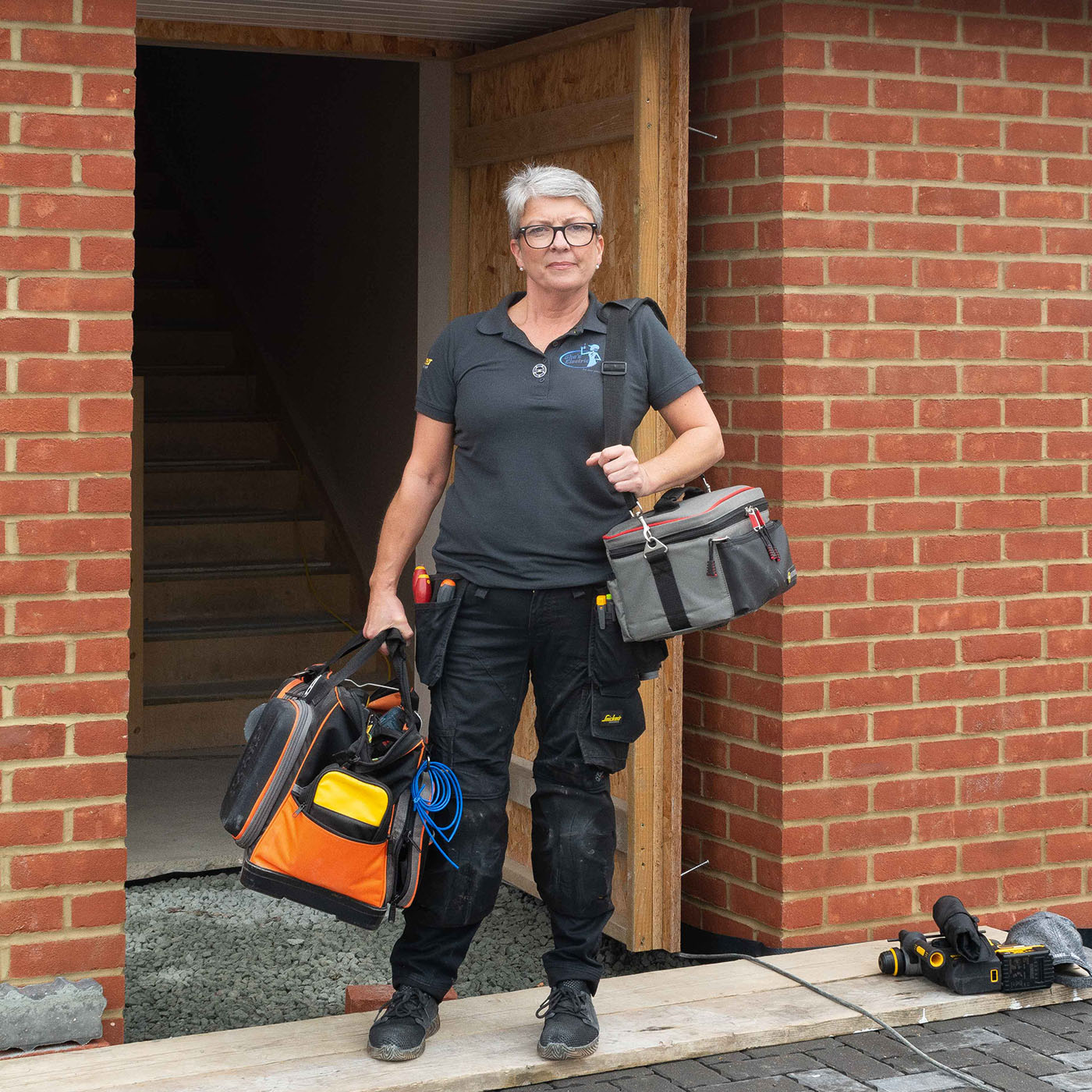 Wiring and Rewiring Services this image shows Karen arriving at a property with all her electrician tools